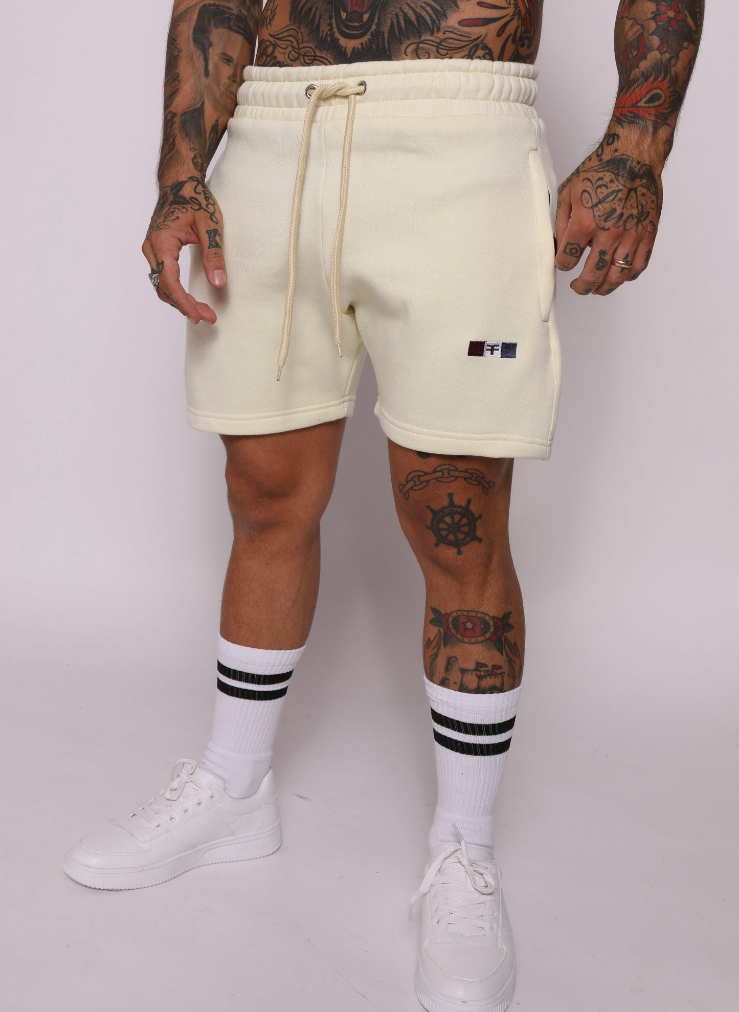 tapered fit zipper short - pastel light yellow